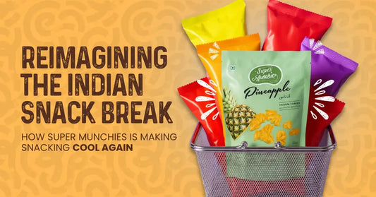 A basket filled with colorful packets of Super Munchies snacks sits beside bold text that reads, "Reimagining the Indian Snack Break" and "How Super Munchies is making snacking cool again.